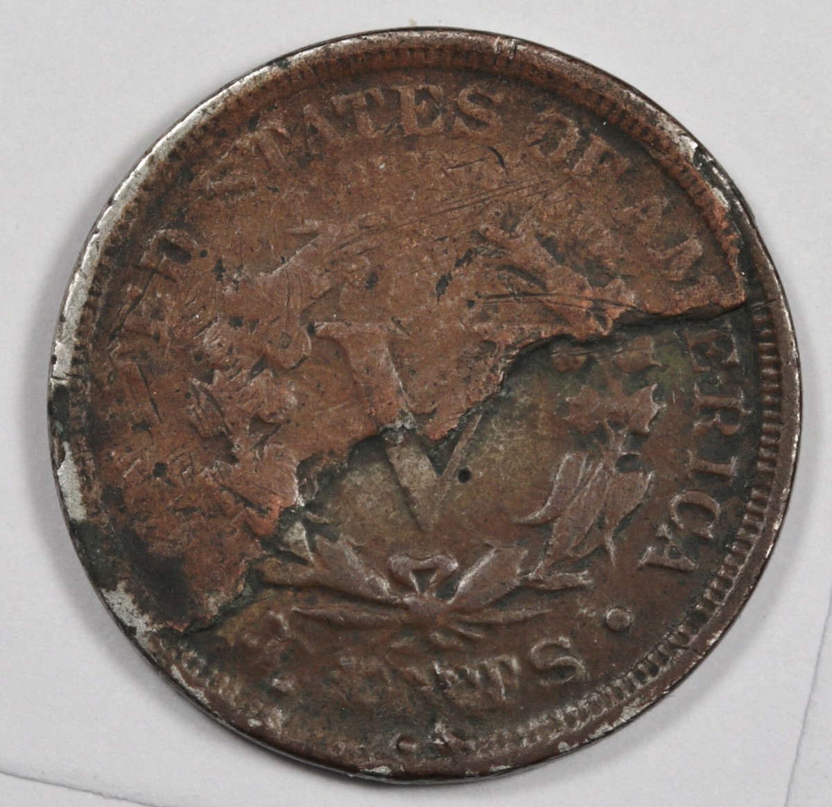 1904 Liberty Head Nickel struck on a wrong foreign planchet error coin, showing unusual size and edge characteristics