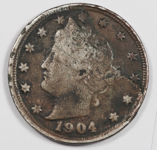 1904 Liberty Head Nickel lamination flaw error showing peeling or separated metal layer on the coin surface